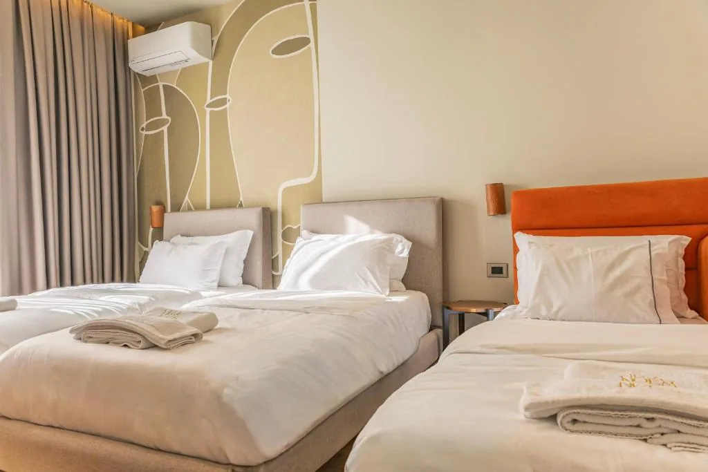 Deluxe Triple Room — Villa Noem